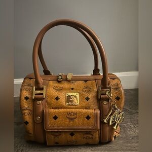 Authentic MCM Cognac Leather Boston with Gold Bag Charm